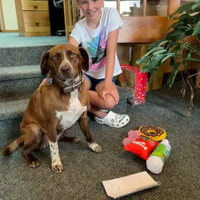 This is Hayden, with our office pup, Charley!