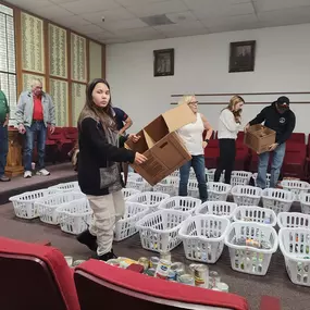 We're donating a few hams and my daughters time to feed the less fortunate this Christmas.  Doesn't she look so Happy?!?  We're proud to support the local Elks Lodge Kingman and the Turquoise Queens/Kings charity efforts.