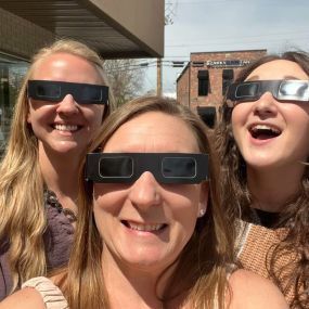 The team watching the solar eclipse! Shoutout to Servpro for the shades!