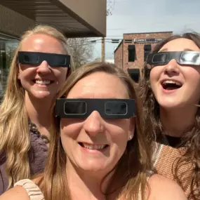 The team watching the solar eclipse! Shoutout to Servpro for the shades!