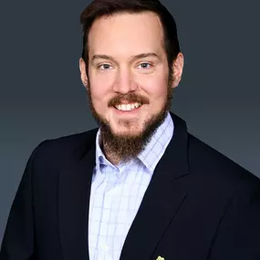 Let's hear it for Joey, who's been crushing it at Susan Rauser’s office for almost a decade in sales – way to go, Joey! Outside of work, Joey's got an amazing family – a food-loving wife and a super creative 11-year-old son. They used to have a pet named Molly, too. Joey's food cravings vary, but he's always down for a fresh soft pretzel. What keeps Joey pumped about working at Susan's office? It's the awesome team spirit, for sure! And here's a fun fact – Joey's a huge Star Wars fan and listens