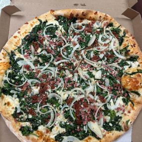 Happy National Pizza Day!  Our office celebrated with a delicious Carbonara pizza from Boston’s. We are also very excited for Super Bowl Sunday! Who do you think is going to win the big game?