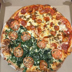 Last week our office had a delicious half pepperoni sausage and half spinach garlic tomato pizza for National pizza party day.  What’s your favorite type of pizza?