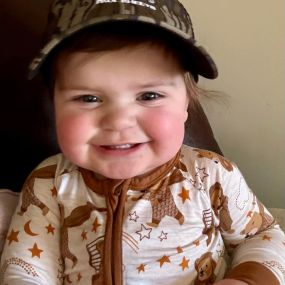 Happy Friday from our hat loving friend, sweet Miss Cora Jayne!  She loves wearing her Paul Sheets camo hat just like her Daddy