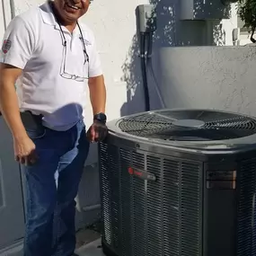 Blue Star HVAC technician installing new Trane system