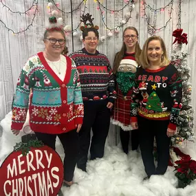 On the fourth day of Christmas Jake showed to me... a group of us wearing sweaters that are ugly!