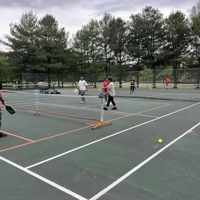 We had a great time with our Pickle Ball Lessons!!  Nothing says team bonding like a little sweat and learning!  Thank You Carson Bozman