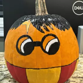 We had some fun with a pumpkin carving contest in our office! Take a look at our creations and see which one got the most likes!