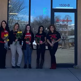 Handing out roses to brighten someone's day