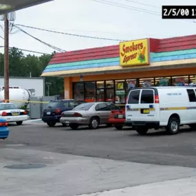 23 years ago we started our Agency in the Smokers Express Gas Station in Orange Park, Florida. ￼ As a bonus, the neighboring convenience store was held up on our first day. The yellow police tape and crime van gave the place a little class.