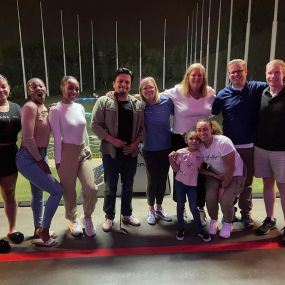 Cleo Meyer State Farm Insurance team celebrating at Top golf