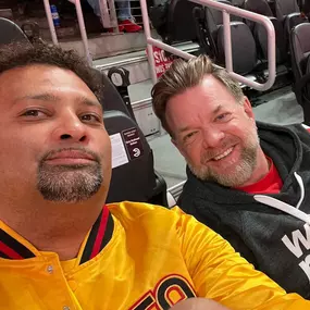 Hanging with fellow agent, Chris Richardson, at the Hawks game