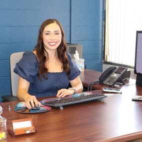 Agent Veronica Sanchez in her office ready for your appointment.