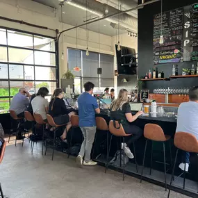 By day, we're your friendly neighborhood coffee shop ready to kick start your mornings with aromatic brews and mouthwatering breakfast options. And by night, we're a lively cocktail lounge help you unwind with unique cocktails and craft beer!