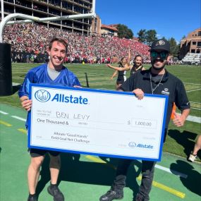 Celebrating a successful 25-yard field goal as part of the Allstate “Good Hand” Field Goal Net Program.  The kicker won $1000 and the University of Colorado scholarship fund received a matching donation.