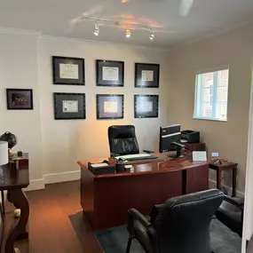 Attorney Chad Pajerski’s office with professional certifications displayed.