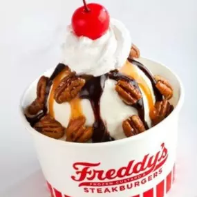 Frozen Custard with Pecans, Chocolate Syrup, Caramel Syrup, Whipped Cream, and Cherry on top