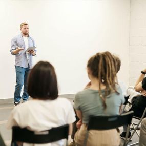 Group therapy sesssion with a speaker at Cornerstone of Southern California