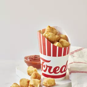 Tater tots in Freddy's cup with ketchup