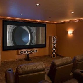 Mr Amp team setting up a home theater system in Ogden, UT. Superior audio-visual experience tailored for your home