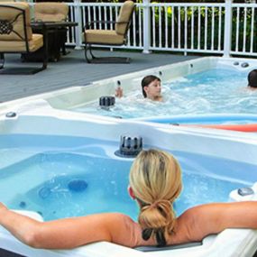 The Dual-Temperature Swim Spa, available at The Hot Tub Store in Oakland, MD, is the ultimate relaxation and workout solution all in one.