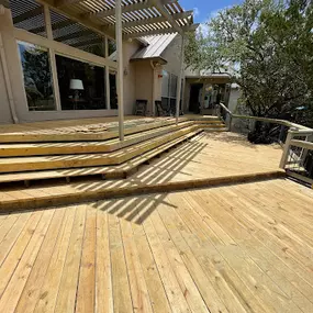 Deck renovation, including structural reinforcement, re-decking, and refinishing