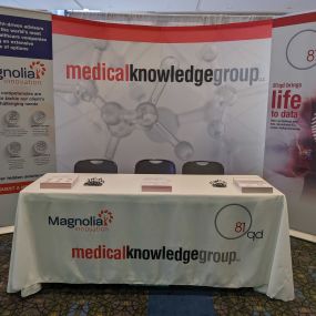 Medical Knowledge Group Booth at a Pharmaceutical Conference with Magnolia Innovation and 81qd.