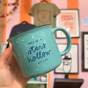 Meet Me In Stars Hollow, won’t ya?! Join us NEXT Saturday to celebrate your favorite show (and mine) in #annarbor at Rock Paper Scissors ! We have so much fun new merch- here’s a sneak peek of a few of my favorite mugs- including a cameo from Bernie Roundbottom, himself ????❤️☕️????