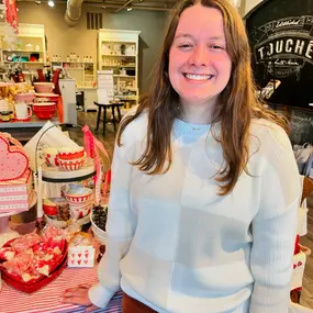 Meet Mazzy!
Mazzy is our fun, quirky, adorable newlywed! She is an expert in finding the perfect gift as well as wrapping it. You can count on her wearing a fun pair of Converse shoes and a big smile! She is loyal, and loveable, and lots of fun, and we adore her!