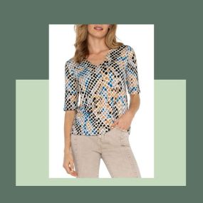 Fierce and fashionable???????? Our Liverpool Half Sleeve V-Neck Print Top has a reptile design and combination of colors that brings the wild to your wardrobe!