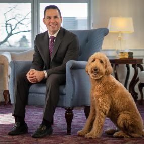 Matthew Fiorillo and Lulu, our comfort companion, of Ballard-Durand Funeral & Cremation Services