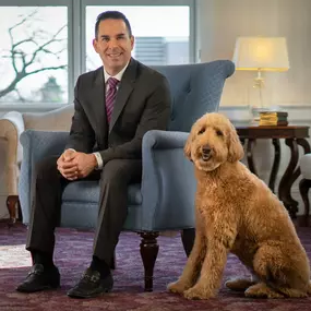 Matthew Fiorillo and Lulu, our comfort companion, of Ballard-Durand Funeral & Cremation Services