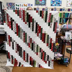 Barbara finished her Christmas LUNA quilt. Isn't it BEAUTIFUL?!!!
The Luna quilt is Jelly Roll and Fat Quarter friendly.
& Don't forget Christmas fabrics are on sale until January 31st.