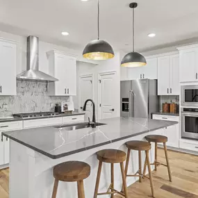 Gourmet kitchen with large center island.