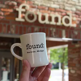 Start your day with a slice of nostalgia with our white ceramic diner-style mug, emblazoned with our logo. Whether you're sipping your morning coffee, or winding down with a cozy tea, this mug is the perfect companion. It's a little bit of Ann Arbor, right in your hands. 

Make a statement, share a story, and support your favorite local spot with every cup. Bring a piece of Found into your home!