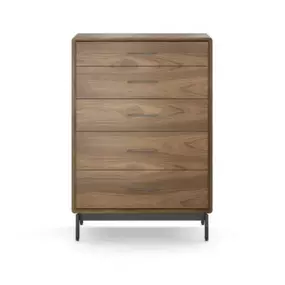 Crafted with beautiful natural hardwoods and hardwood veneers, LINQ’s smooth, contoured design lends modern elegance to any bedroom.  Tall and modern, the LINQ 5-drawer chest stands strong with precision construction. Included wire wraps attach to the back to keep cords controlled.