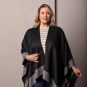 Fashion and comfort collide with the on-trend Reversible Kimono. Gray on one side and a neutral camel on the other! Made with super soft and luxurious fabrics, our Comfort Collection wraps you in warmth and tranquility whenever worn or used - just like a hug!