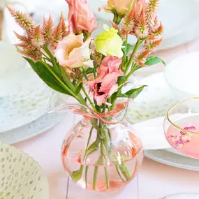 Skilled Tuscan artisans reimagine the beauty and delicate nature of the hibiscus flower in our mouthblown Hibiscus Glass. Curving, romantic, and fresh, the collection exudes easy elegance. The hue of the Hibiscus Glass Pink Bud Vase brings warmth and beauty to even the simplest floral arrangement.