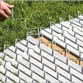 Contractor working on fence slats