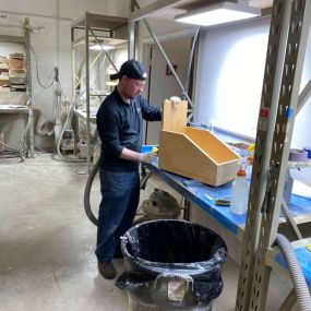 N-Hance Wood Refinishing of Chicago technician working on cabinet refacing in Des Plaines facility
