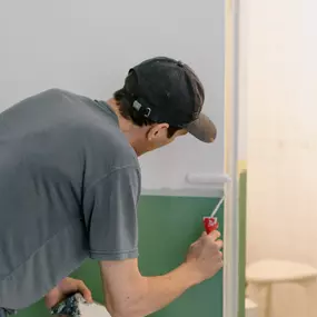 Technician doing home painting in Omaha, NE