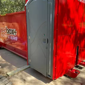 redbox+ of Greater Athens Elite Dumpster with portable bathroom