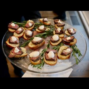 Petite Filet Mignon on garlic bread with horseradish creme