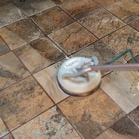 Tile cleaning process in progress at Fort Smith, AR business