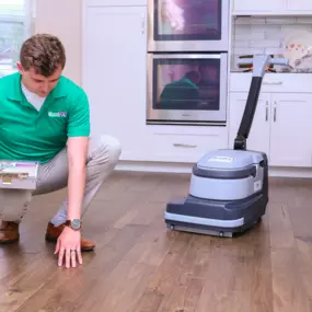 Chem-Dry technician performing wood floor cleaning