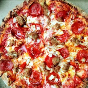 Pepperoni, sausage, and onion pizza