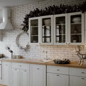 Holiday kitchen with white painted cabinets in Mount Pleasant