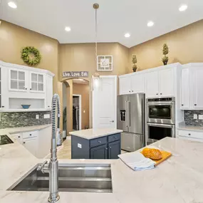 Large kitchen after cabinet painting in Mount Pleasant