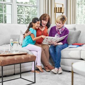 Family enjoying clean carpet and upholstery