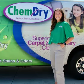 Service technician standing next to van